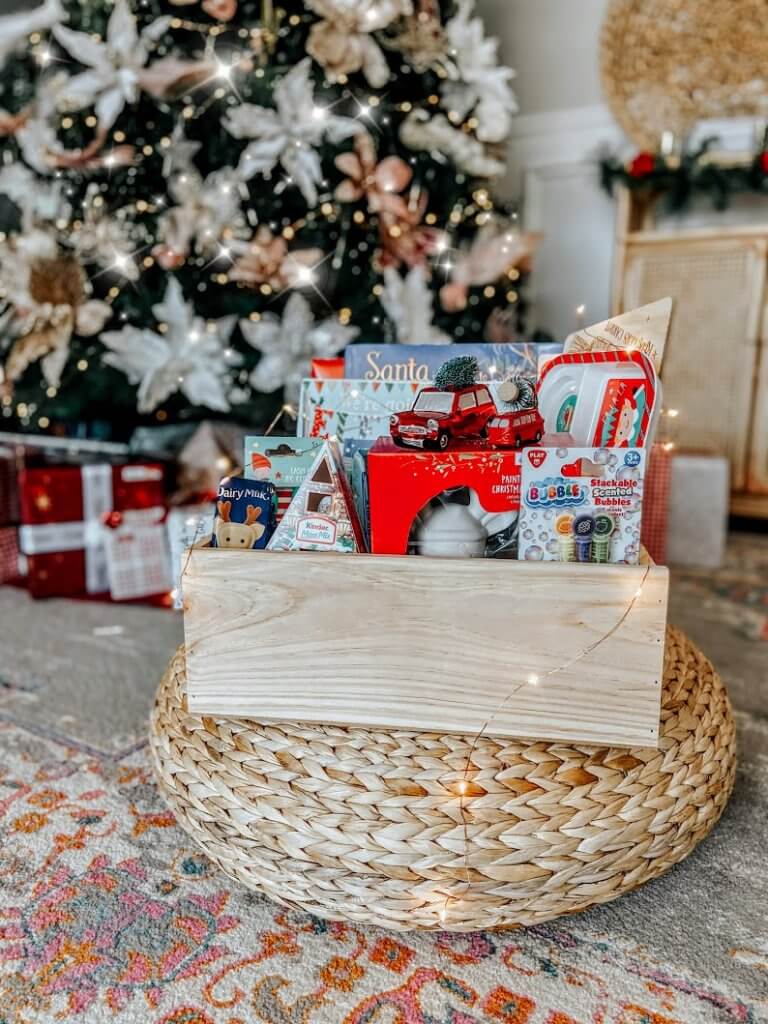 Noah’s very first Christmas Eve box ! See what goodies I’ve popped inside this year !